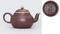 INCISED MAKER’S MARK MENGCHEN, 18TH CENTURY  A RARE GOLD-MOUNTED YIXING TEAPOT